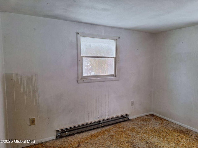 2459 Delaware Tpke, New Scotland, NY 12186 - carpeted empty room featuring baseboards and a baseboard heating unit