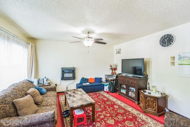 27 Columbia St, Hudson, NY 12534 - living area with carpet flooring, a ceiling fan, a textured ceiling, and heating unit