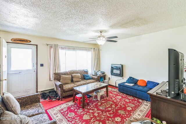 27 Columbia St, Hudson, NY 12534 - living area featuring a textured ceiling, ceiling fan, a baseboard heating unit, carpet, and baseboards