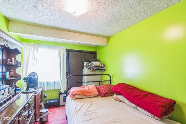 27 Columbia St, Hudson, NY 12534 - carpeted bedroom featuring a textured ceiling