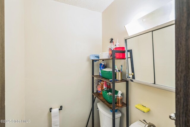 27 Columbia St, Hudson, NY 12534 - half bath with toilet and a textured ceiling