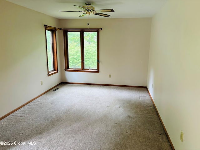 8 Lee Ave, Rexford, NY 12148 - carpeted empty room with a ceiling fan and baseboards