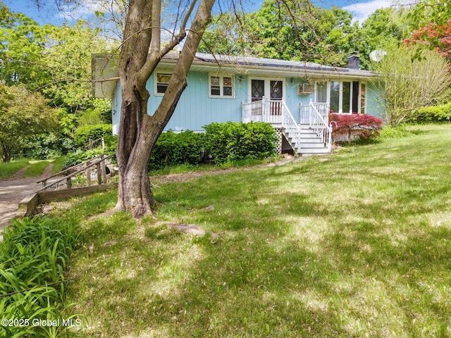 2 Pheasant Ln, East Greenbush, NY 12061 - single story home with a front lawn and a chimney