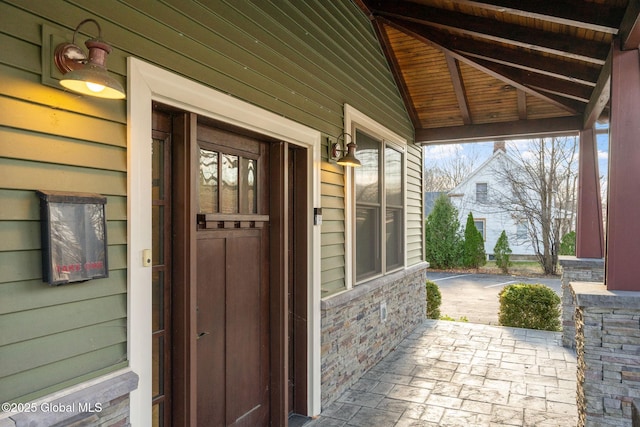 658 Saratoga Rd, Glenville, NY 12302 - doorway to property featuring covered porch