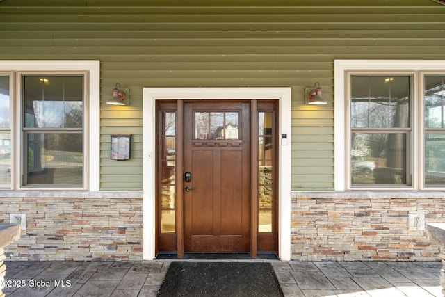 658 Saratoga Rd, Glenville, NY 12302 - doorway to property with stone siding and covered porch