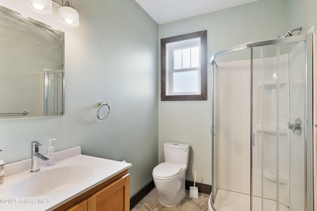 658 Saratoga Rd, Glenville, NY 12302 - full bathroom with a stall shower, vanity, and toilet