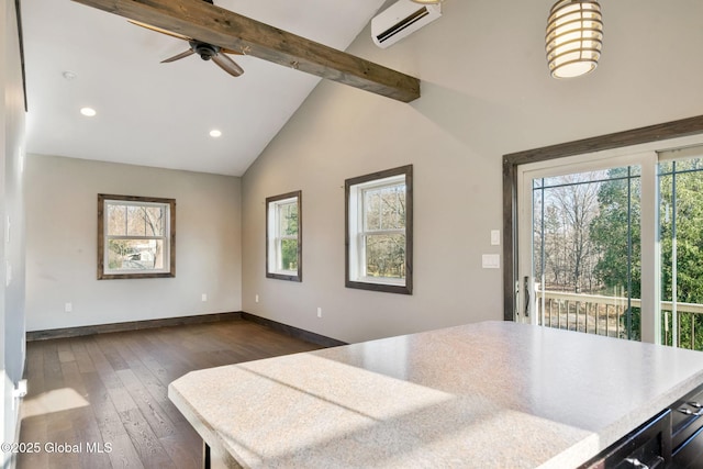658 Saratoga Rd, Glenville, NY 12302 - kitchen with plenty of natural light, a wall unit AC, baseboards, dark wood-style flooring, and recessed lighting