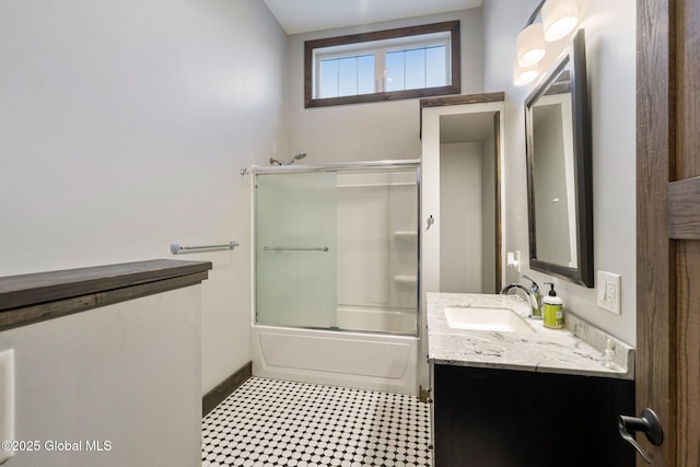 658 Saratoga Rd, Glenville, NY 12302 - bathroom featuring vanity and combined bath / shower with glass door