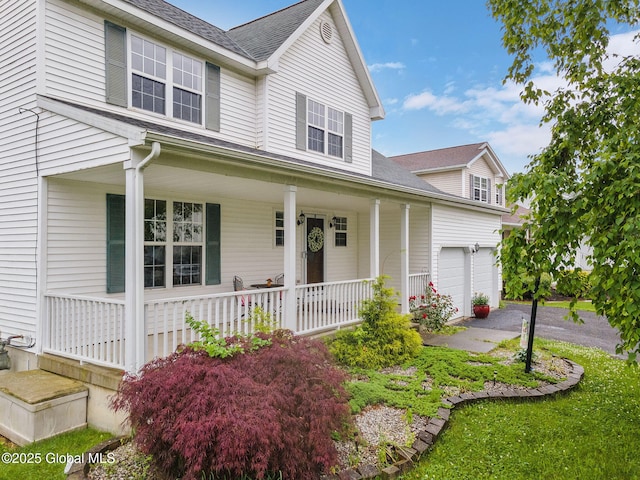 51 Wynantskill Way, Troy, NY 12180 - traditional-style home with covered porch, a shingled roof, and driveway