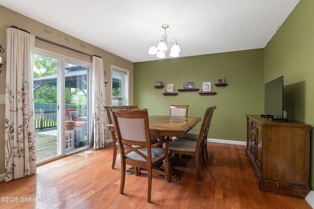 51 Wynantskill Way, Troy, NY 12180 - dining space with a chandelier and light wood-style flooring