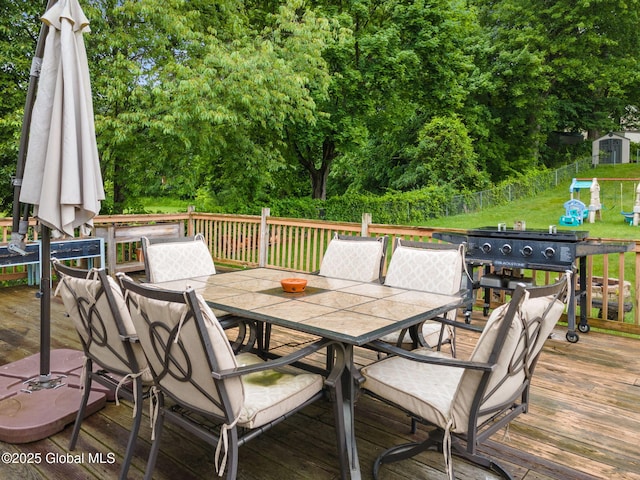 51 Wynantskill Way, Troy, NY 12180 - wooden deck with outdoor dining space and view of scattered trees
