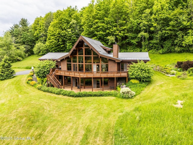 47 County Route 28, Hebron, NY 12832 - back of house featuring a wooden deck, a chimney, a yard, stairway, and a patio