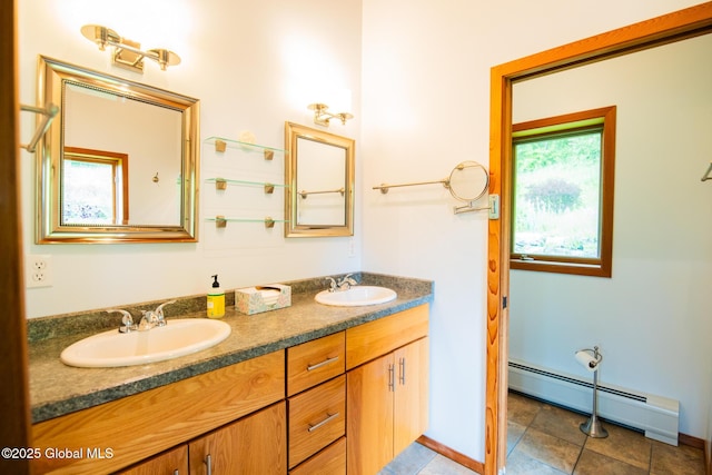 47 County Route 28, Hebron, NY 12832 - full bath with a baseboard heating unit, double vanity, and tile patterned floors