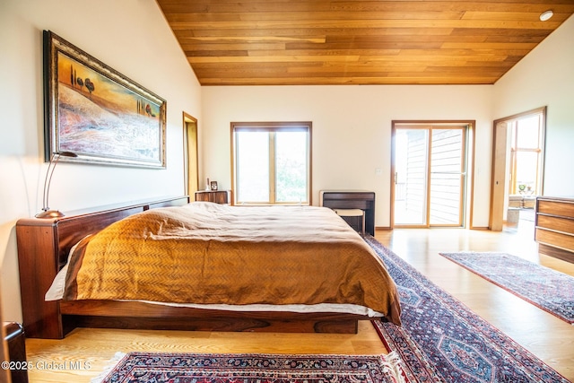47 County Route 28, Hebron, NY 12832 - bedroom with wood ceiling, multiple windows, lofted ceiling, wood finished floors, and access to exterior