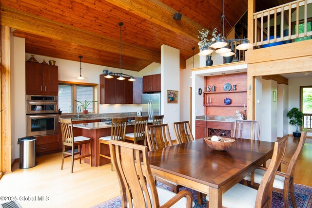 47 County Route 28, Hebron, NY 12832 - dining area with lofted ceiling and wooden ceiling