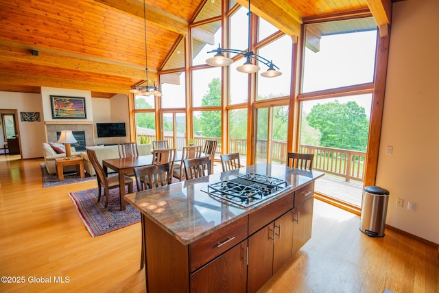 47 County Route 28, Hebron, NY 12832 - kitchen with stovetop with downdraft, high vaulted ceiling, plenty of natural light, wooden ceiling with exposed beams, and light wood-type flooring