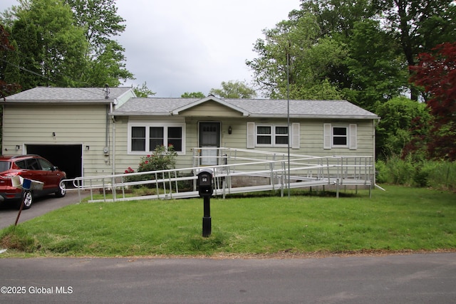 58 Fisler Ave, Colonie, NY 12304 - ranch-style house featuring a garage, roof with shingles, and driveway
