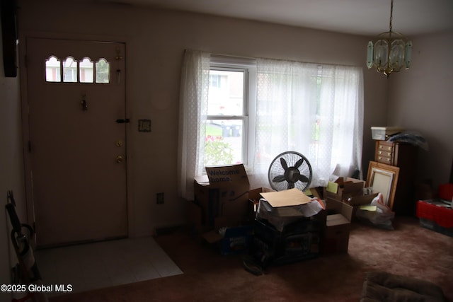 58 Fisler Ave, Colonie, NY 12304 - entryway featuring a chandelier and carpet