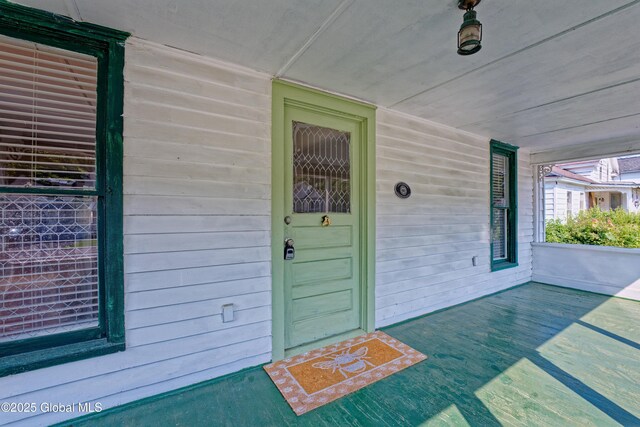 970 Main St, Clifton Park, NY 12065 - property entrance featuring a porch