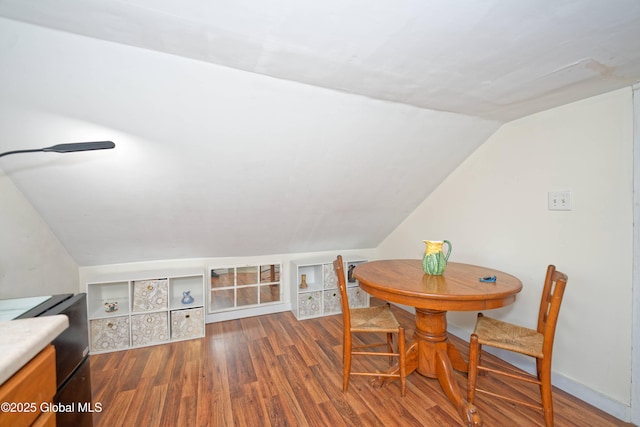 970 Main St, Clifton Park, NY 12065 - dining room with lofted ceiling and wood finished floors