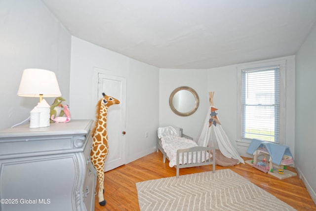 970 Main St, Clifton Park, NY 12065 - bedroom with light wood-style flooring and baseboards
