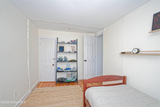 970 Main St, Clifton Park, NY 12065 - bedroom featuring wood finished floors and baseboards