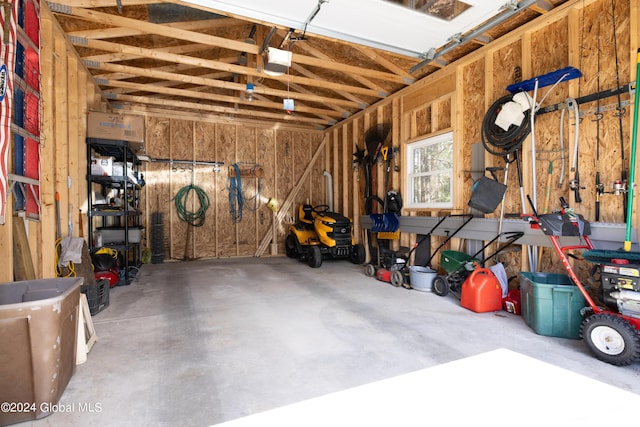 51 Rollman Cir, Hadley, NY 12835 - garage featuring a garage door opener