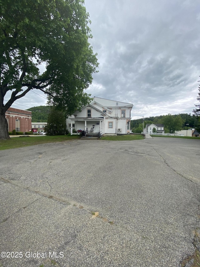3847 Main St, Warrensburg, NY 12885 - view of front facade with uncovered parking