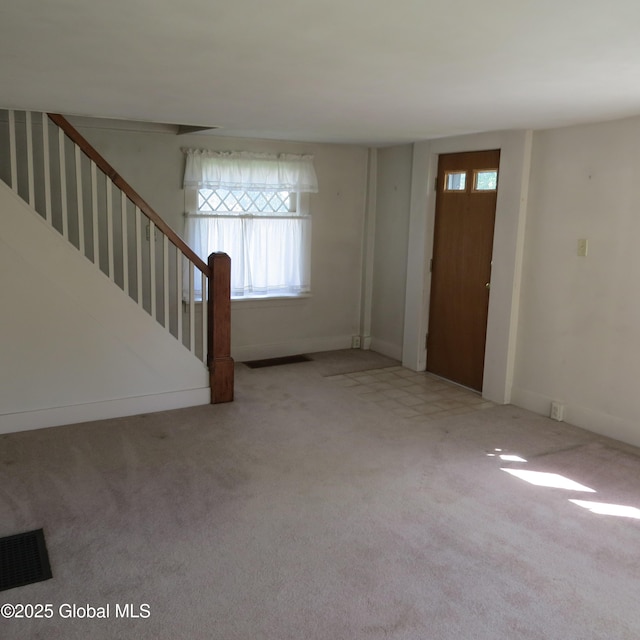 60 Bridge St, Broadalbin, NY 12025 - entryway with carpet and stairway