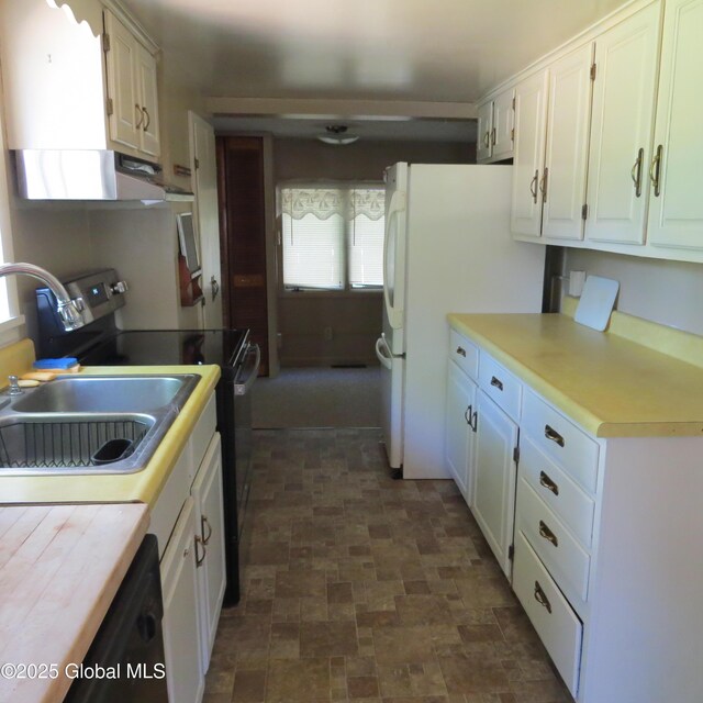 60 Bridge St, Broadalbin, NY 12025 - kitchen with ventilation hood, black appliances, healthy amount of natural light, and white cabinetry