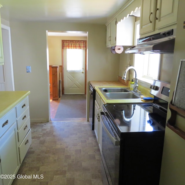 60 Bridge St, Broadalbin, NY 12025 - kitchen with electric stove, under cabinet range hood, light countertops, and dishwasher