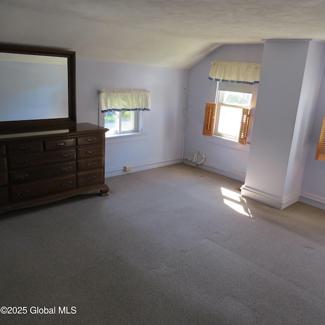 60 Bridge St, Broadalbin, NY 12025 - unfurnished bedroom with vaulted ceiling and carpet flooring