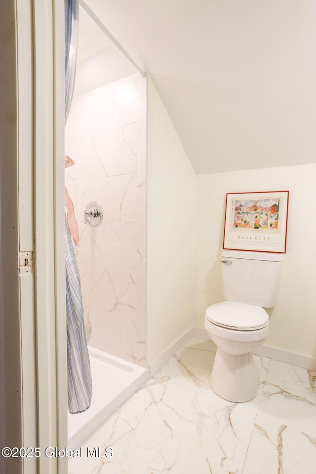 209 Whitehall Rd, Albany, NY 12209 - bathroom featuring marble look tiles, toilet, a stall shower, baseboards, and lofted ceiling
