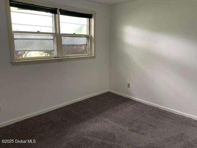 2070 Grand Blvd, Niskayuna, NY 12309 - unfurnished room with dark colored carpet and baseboards