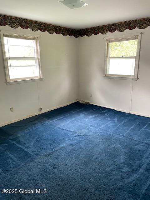 2070 Grand Blvd, Niskayuna, NY 12309 - unfurnished room with dark carpet and baseboards