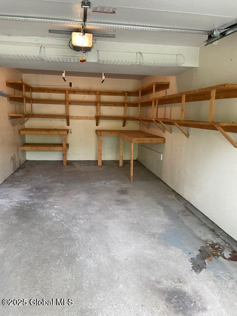 2070 Grand Blvd, Niskayuna, NY 12309 - garage featuring a garage door opener