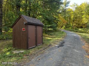 138 Lydon Ln, New Baltimore, NY 12087 - view of shed featuring a wooded view