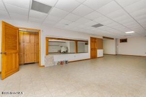 138 Lydon Ln, New Baltimore, NY 12087 - basement featuring a drop ceiling and baseboards