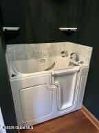 138 Lydon Ln, New Baltimore, NY 12087 - laundry view of wood finished floors and baseboards