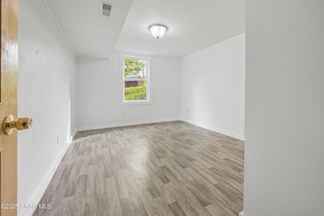 10610 State Highway 7, Worcester, NY 12064 - empty room featuring wood finished floors, crown molding, and baseboards