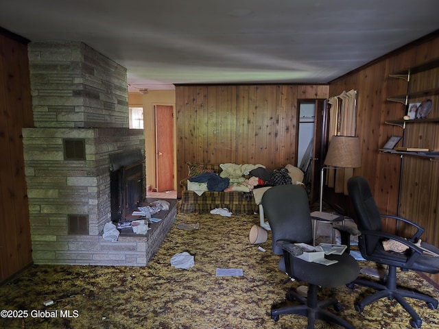 4 S E Ave, Johnstown, NY 12095 - carpeted living area with wooden walls, a large fireplace, and an office area