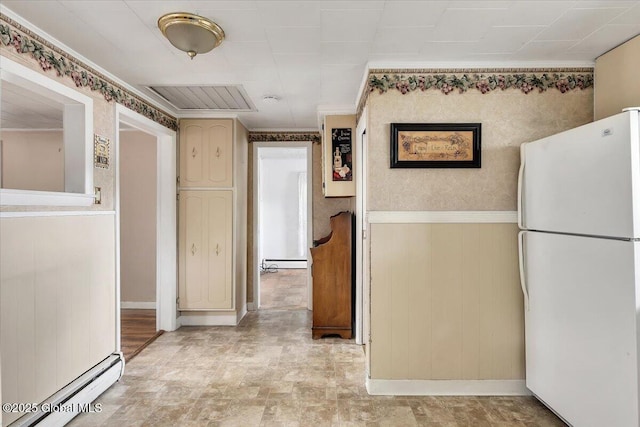 27 Washington Ave, Colonie, NY 12205 - hall with a baseboard heating unit, crown molding, wood walls, wainscoting, and baseboards