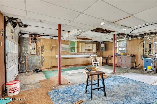 27 Washington Ave, Colonie, NY 12205 - basement featuring electric panel, wood walls, and a heating unit