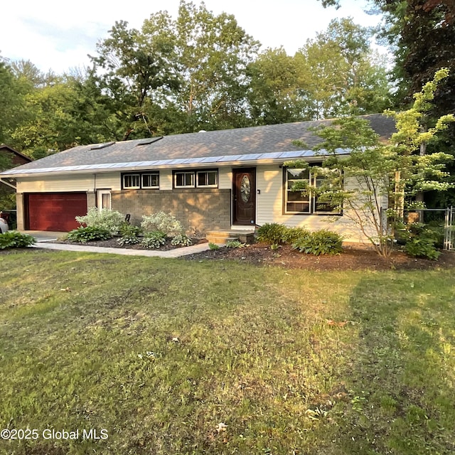129 Okara Dr, Guilderland, NY 12303 - single story home featuring a front yard and an attached garage