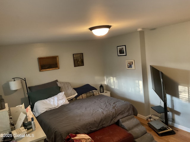 129 Okara Dr, Guilderland, NY 12303 - bedroom featuring wood finished floors and baseboards