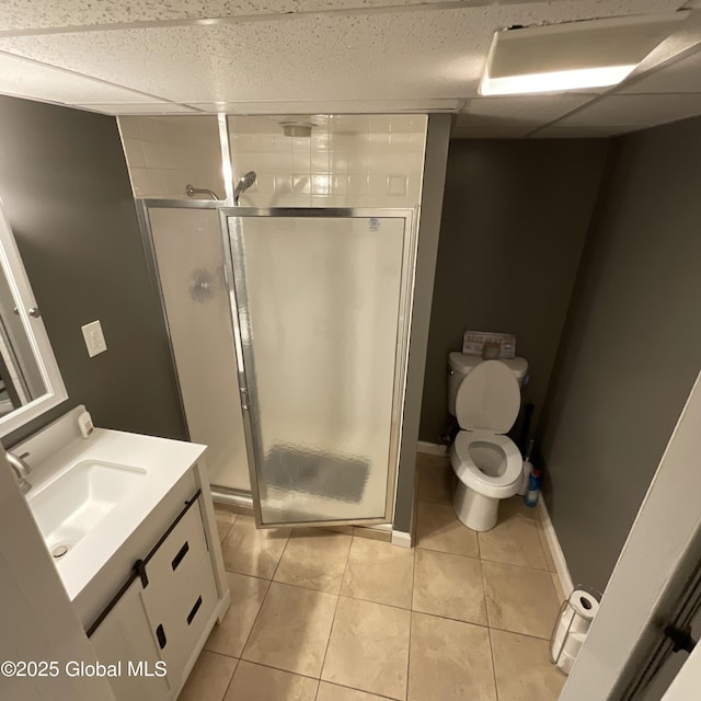 129 Okara Dr, Guilderland, NY 12303 - full bath with toilet, vanity, a shower stall, tile patterned floors, and baseboards