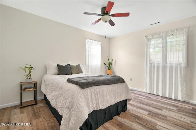 60 Tallow Wood Dr, Clifton Park, NY 12065 - bedroom with wood finished floors, baseboards, and a ceiling fan