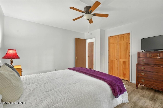 60 Tallow Wood Dr, Clifton Park, NY 12065 - bedroom with wood finished floors, a ceiling fan, and baseboards