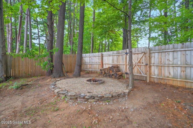 60 Tallow Wood Dr, Clifton Park, NY 12065 - fenced backyard featuring a fire pit