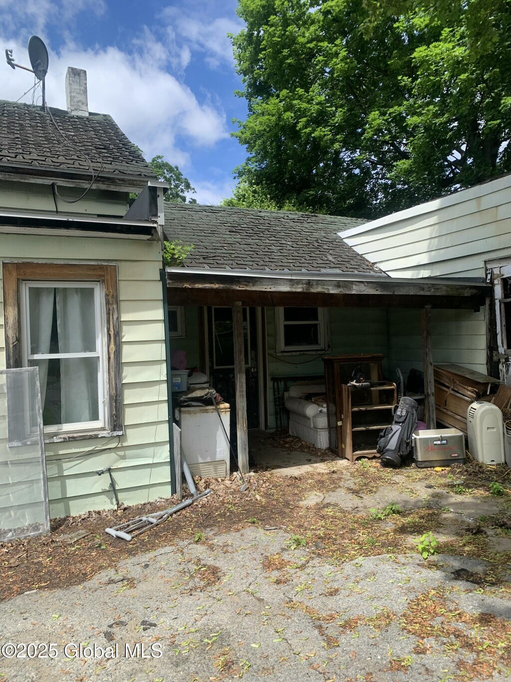 5 Maple Ave, Fort Edward, NY 12828 - view of side of home with a chimney and roof with shingles